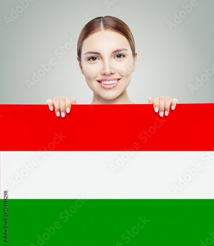 Happy student girl with the Hungary flag background. Study hunga photo