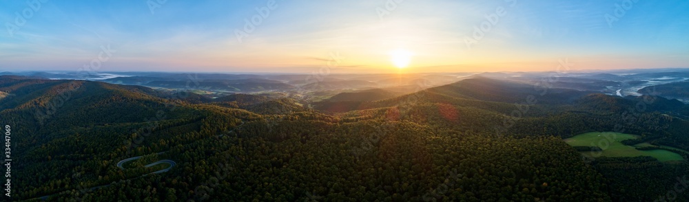 Colorful sunset in a beautiful mountainous area during amazing summer.