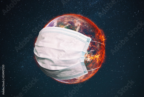 The planet earth is wearing a protective mask in the space. Concept of quarantine, protection from viruses and pandemic. Elements of this image furnished by NASA