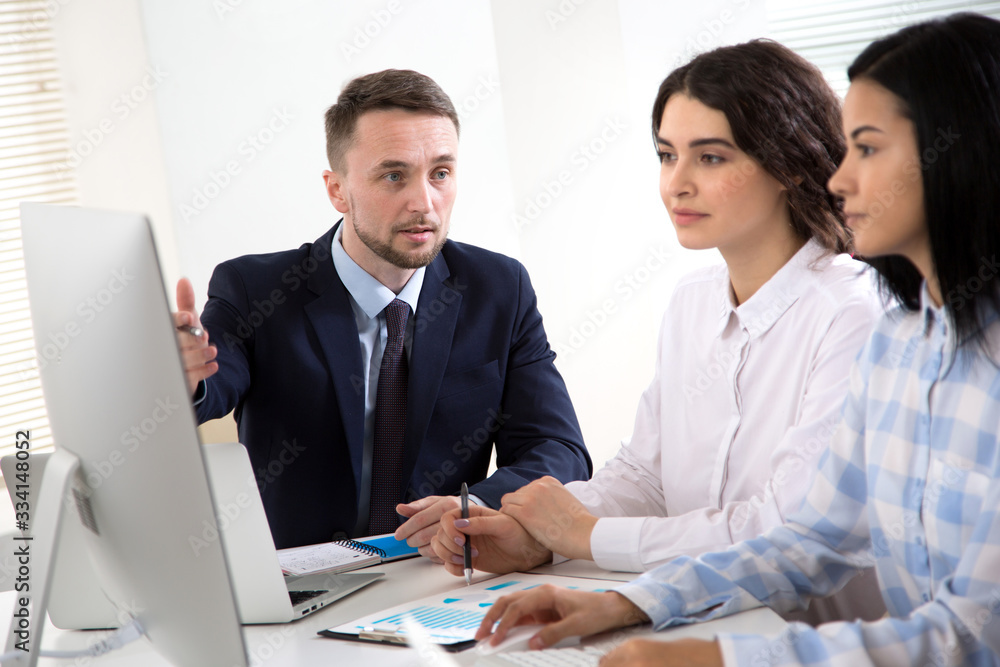 Business people working together in the office Business people working together in the office