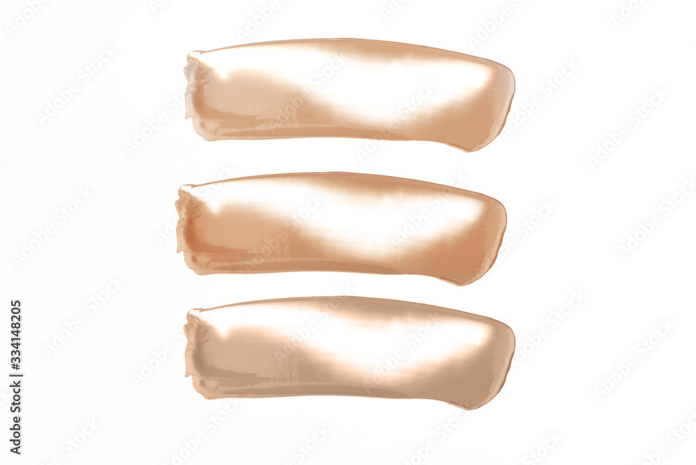 Smears of different tonal creams on an isolated white background. Smears of different tonal creams on an isolated white background.
