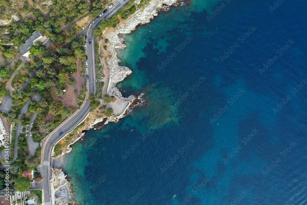 Beautiful line of the sea coast in nice France on the Cote d'azur. Port of nice aerial photography, top view. Blue water.