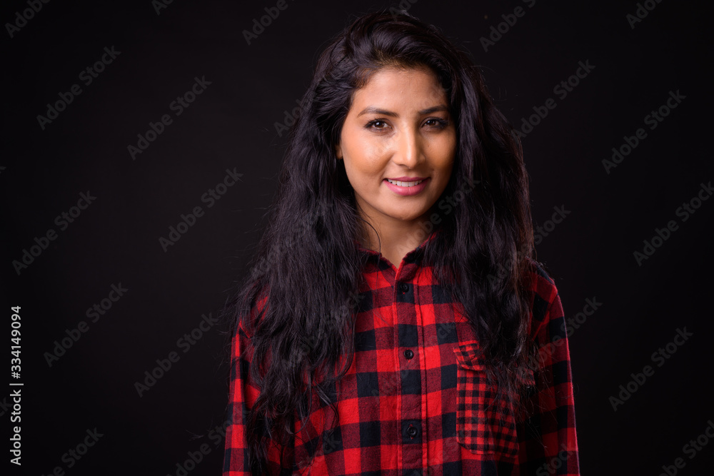 Face of happy young beautiful Indian hipster woman Face of happy young beautiful Indian hipster woman