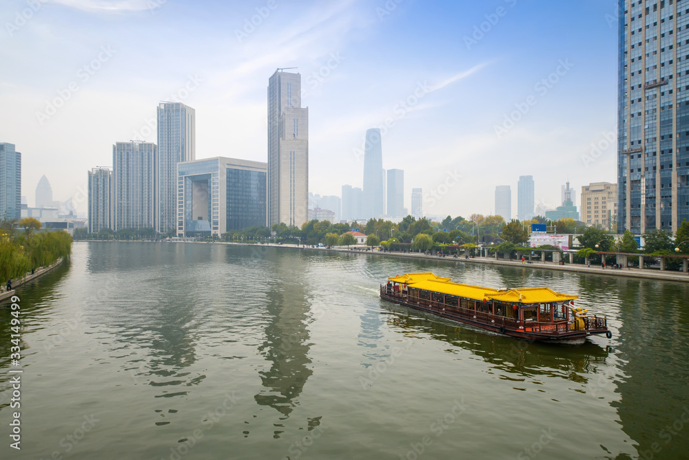 Fototapeta premium Luxury cruise ships sailing on the Haihe River, Tianjin, China