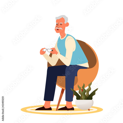 Tired old man sitting in the armchair. Eldery person with lack