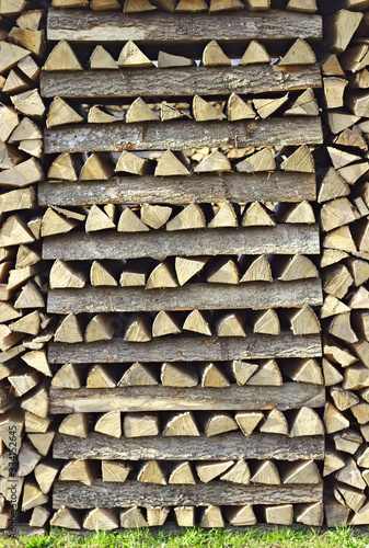 Wood, chopped and stacked. Background with structure.