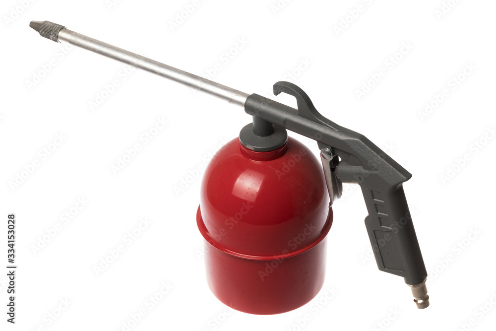 Fototapeta premium Compressor accessorie, red air gun for spraying, isolated on white background