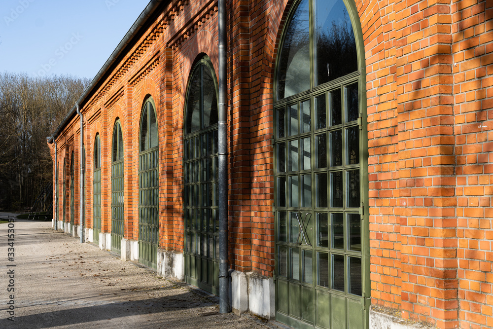 Old fascinating brick building with big windows Old fascinating brick building with big windows