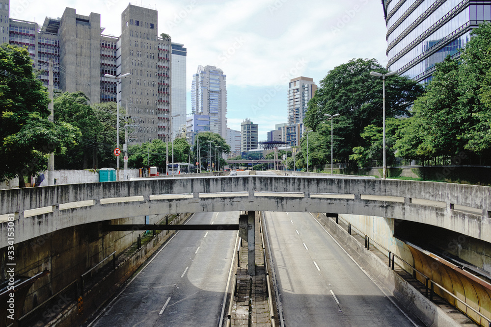 Empty tunel in Vila Olimpia, during coronavirus outbreak, Sao Paulo, Brazil with some cyclists - March 2020