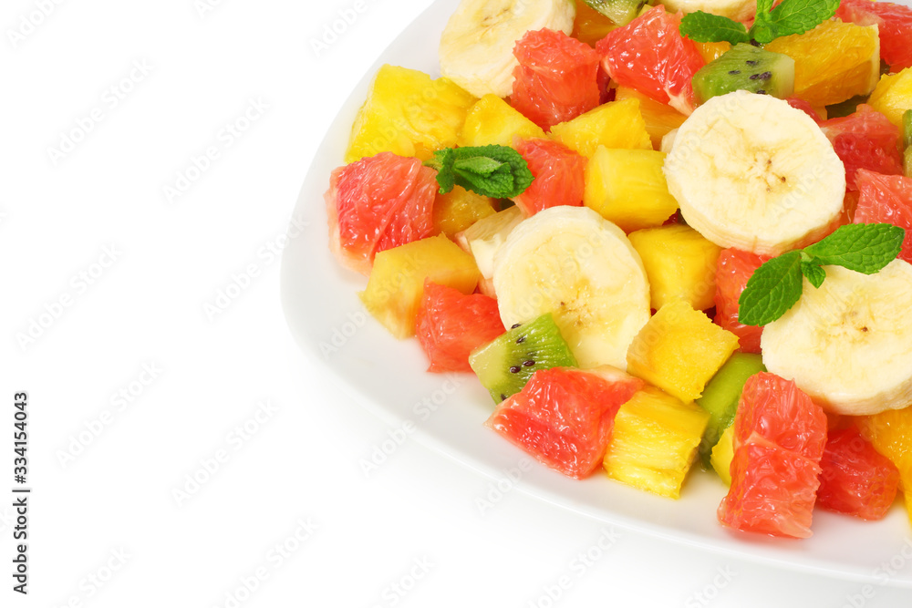 Bowl of healthy citrus fruit salad isolated on white background. Top view. Bowl of healthy citrus fruit salad isolated on white background. Top view.