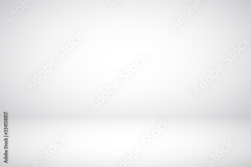 Empty gray studio abstract background with spotlight effect. Product showcase backdrop.