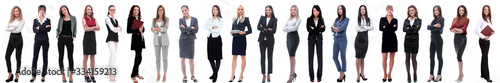 group of successful young businesswoman standing in a row