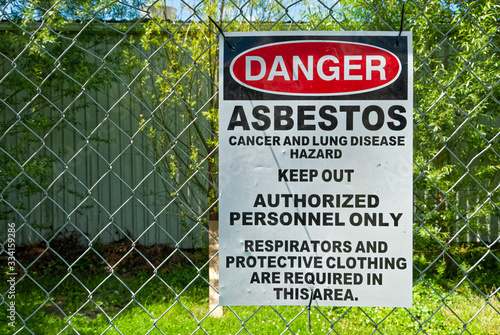 Asbestos sign warning people of the dangers ahead.