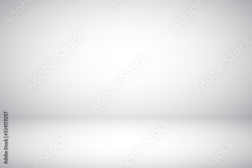 Empty gray studio abstract background with spotlight effect. Product showcase backdrop.