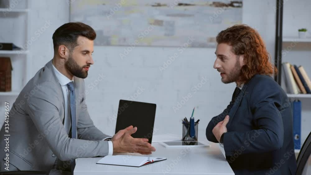 businessman throwing money in face of man businessman throwing money in face of man