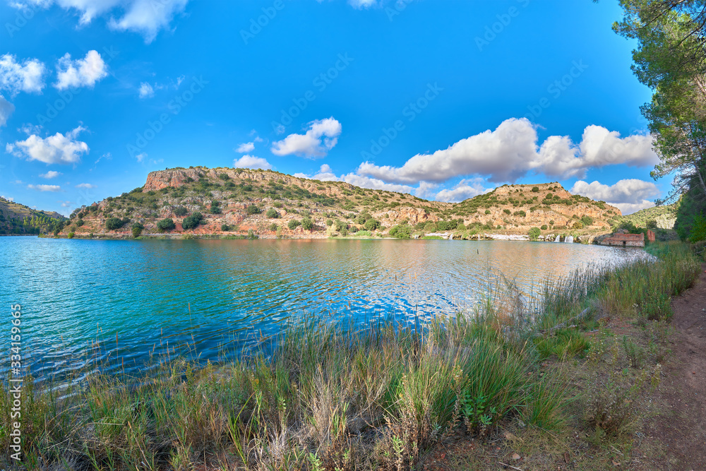 Landscape view of the Laguna Colgada Lake in the Lagunas de Ruidera Lakes Natural Park, Albacete province, Castilla la Mancha, Spain Landscape view of the Laguna Colgada Lake in the Lagunas de Ruidera Lakes Natural Park, Albacete province, Castilla la Mancha, Spain