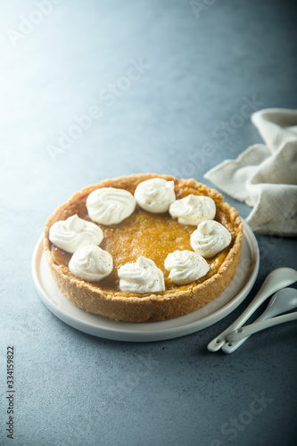 Homemade pumpkin pie with whipped cream