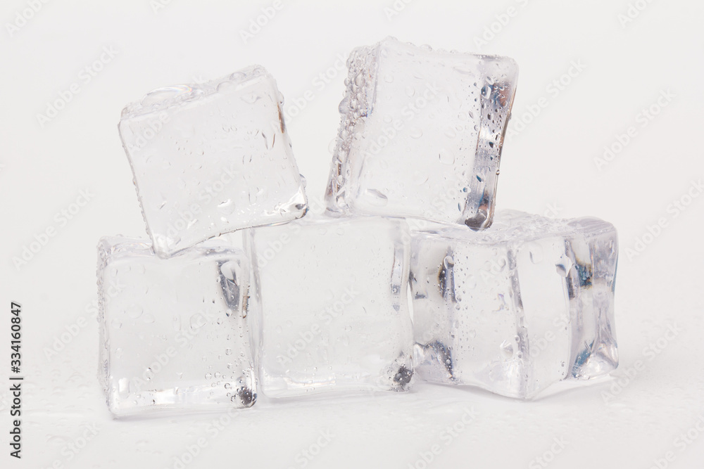 ice cubes in close-up on gray background ice cubes in close-up on gray background