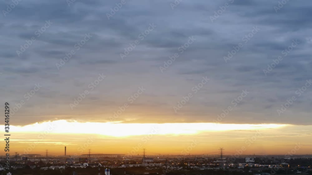 4K Time lapse sunset sunrise and beautiful twilight fluffy storm cloudy blue and yellow sky smoothly flowing to fantastic mind. Rainy good evening and have a nice day concept. 4K Time lapse sunset sunrise and beautiful twilight fluffy storm cloudy blue and yellow sky smoothly flowing to fantastic mind. Rainy good evening and have a nice day concept.
