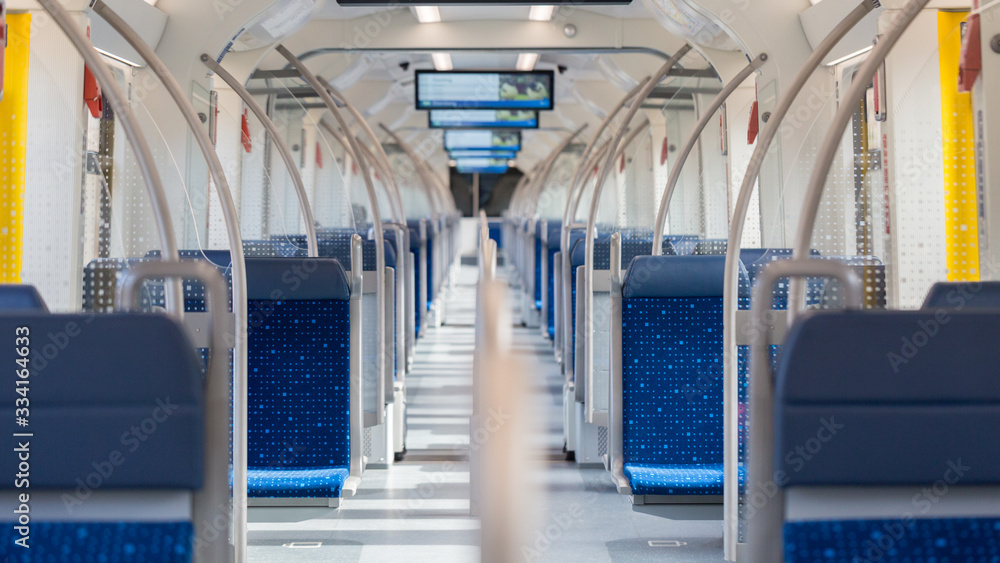 Fototapeta premium Starnberg, Bavaria / Germany - Mar 27, 2020: An empty S-Bahn (Munich public transport train). Due to the exit restricitons related to Covid-19 the number of people commuting decreased significantly.