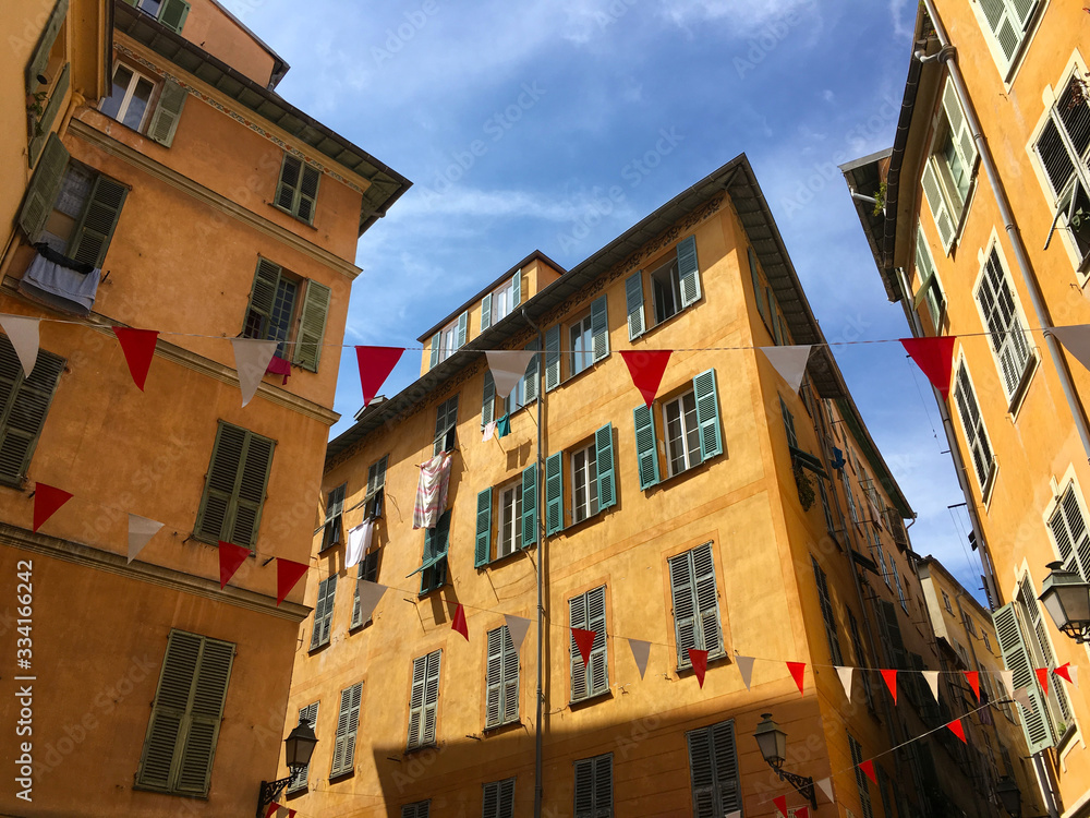 Colorful view of houses with little hanging flags