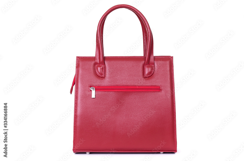 women's red leather bag on the back isolated on a white background women's red leather bag on the back isolated on a white background