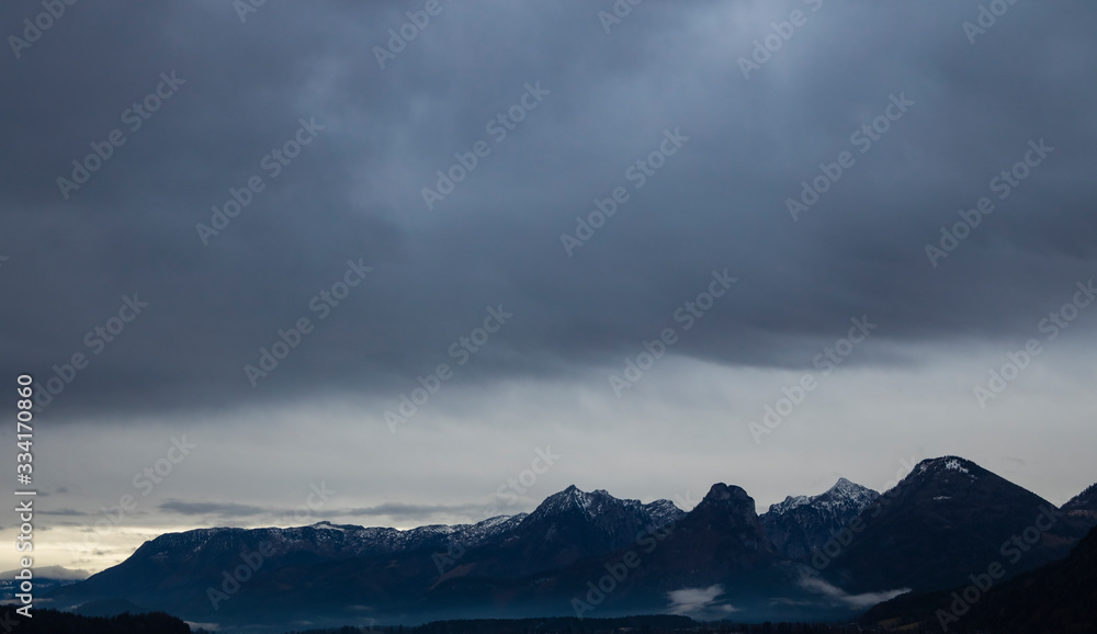 soft focus dramatic rocky mountain ridge wilderness picturesque Alps panorama landscape background