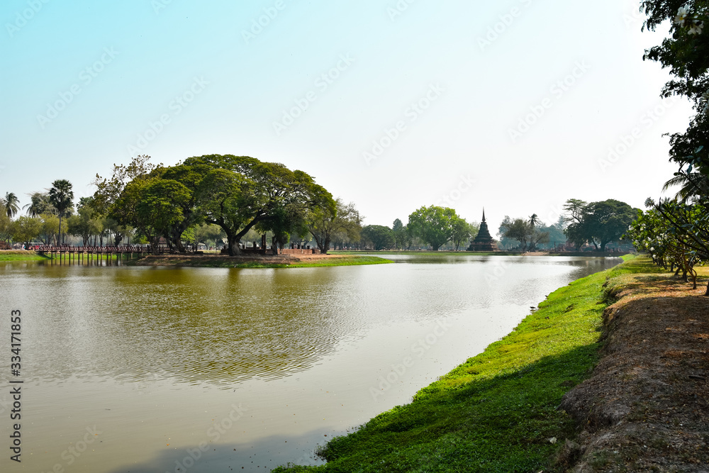 On the grounds of Sukhothai Historical park in Thailand