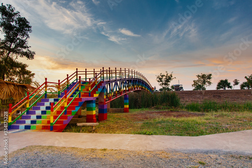 Beautiful rainbow bridge on natural background. © peterkai