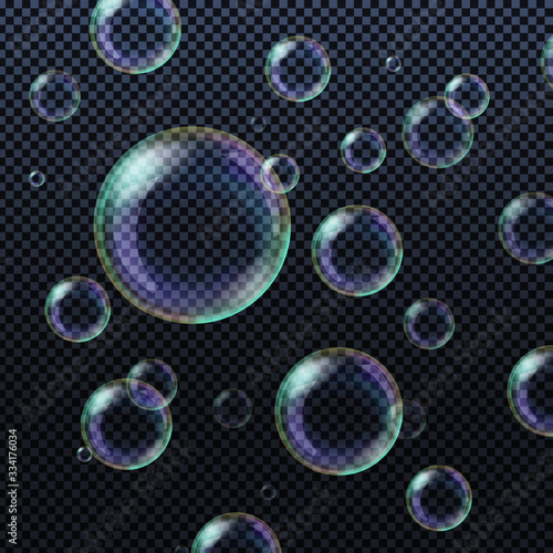 Realistic soap bubbles isolated on transparent background. Vector illustration. 