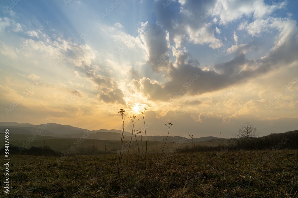 Obraz premium Sunrise or sunset over the hills and meadow. Slovakia