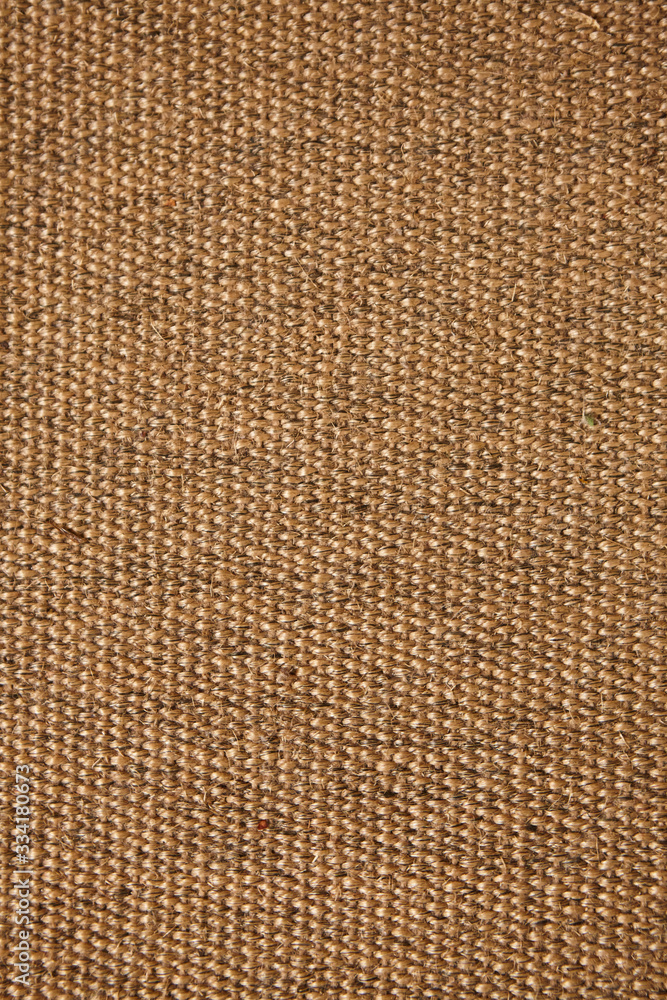 The surface texture of a natural Mat (straw, rope, or other natural material). The surface texture of a natural Mat (straw, rope, or other natural material).