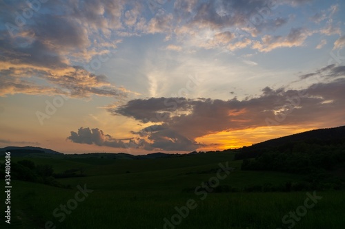 Sunrise or sunset over the hills and meadow. Slovakia