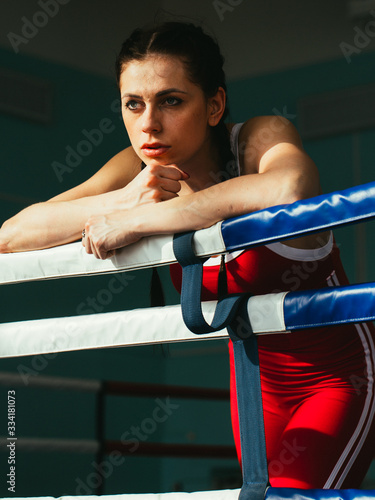 Sports girl boxer on the ring