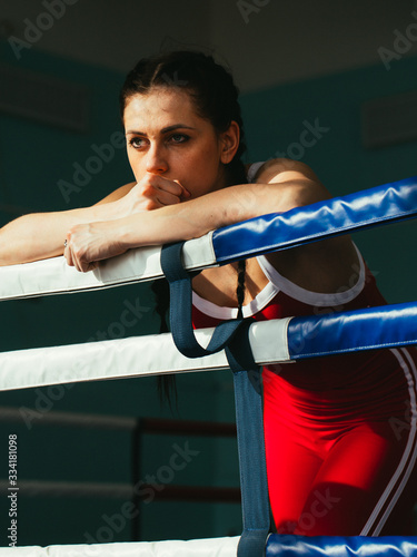 Sports girl boxer on the ring