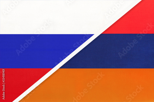 Russia vs Armenia national flag from textile. Relationship and partnership between two countries.