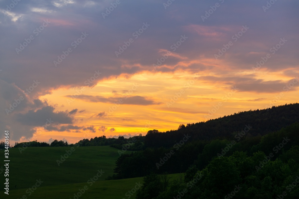 Sunrise or sunset over the hills and meadow. Slovakia