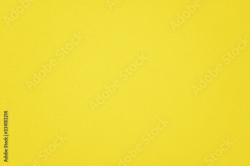 Yellow cement or concrete wall texture for backgrounds. Empty space.