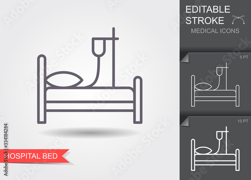 Hospital bed. Line icon with editable stroke. Vector illustration