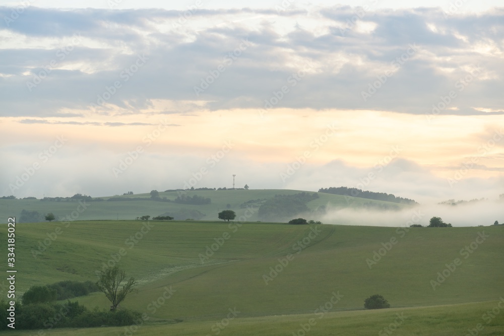 Sunrise or sunset over the hills and meadow. Slovakia