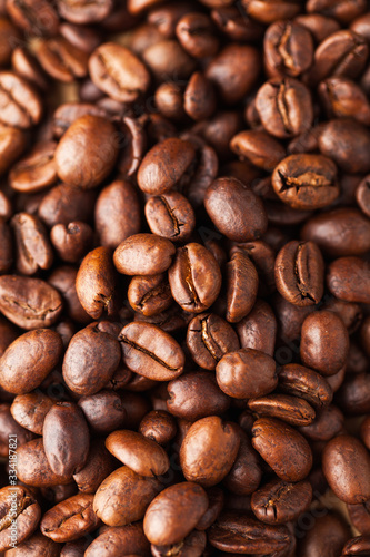 Arabica coffee beans close-up. For screensavers  backgrounds  textures  roasters  and coffee sellers.