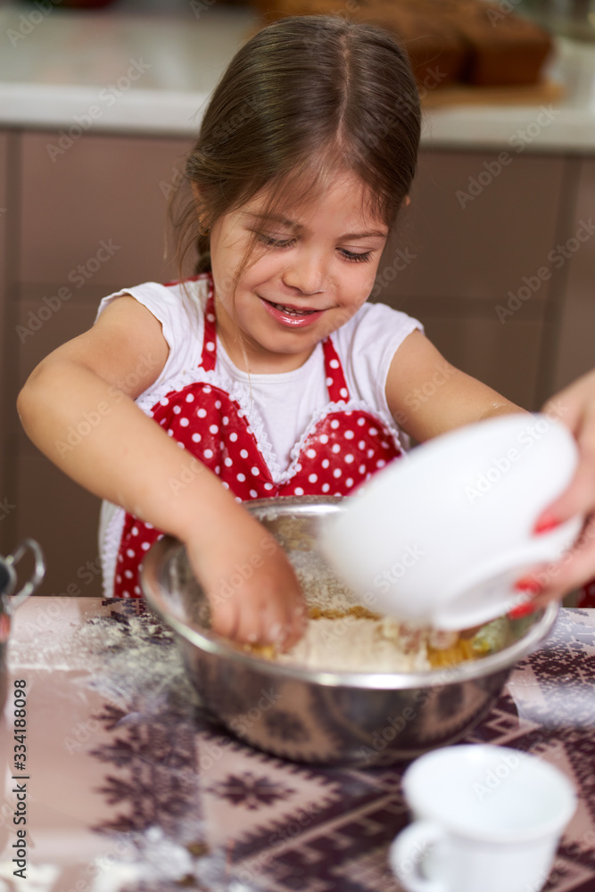 Mother and daughter in the kitchen Mother and daughter in the kitchen