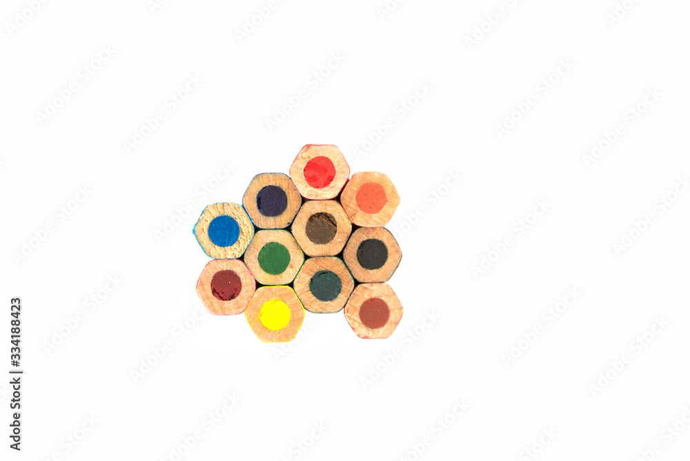 many colorful wooden crayons isolated on the white background many colorful wooden crayons isolated on the white background