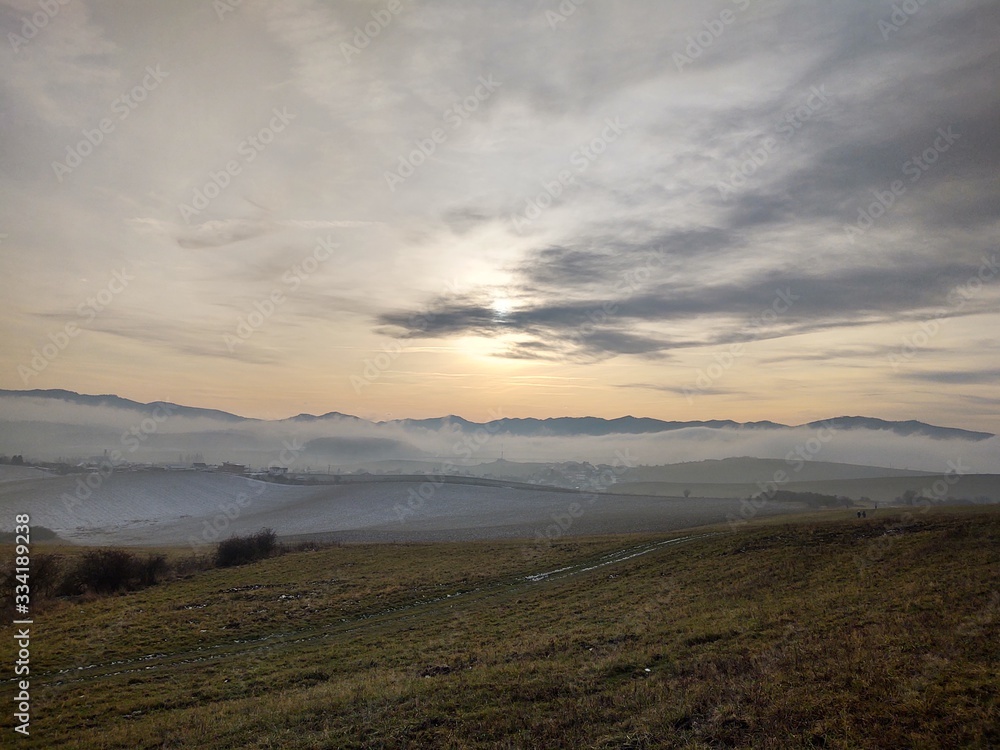 Sunrise or sunset over the hills and meadow. Slovakia	