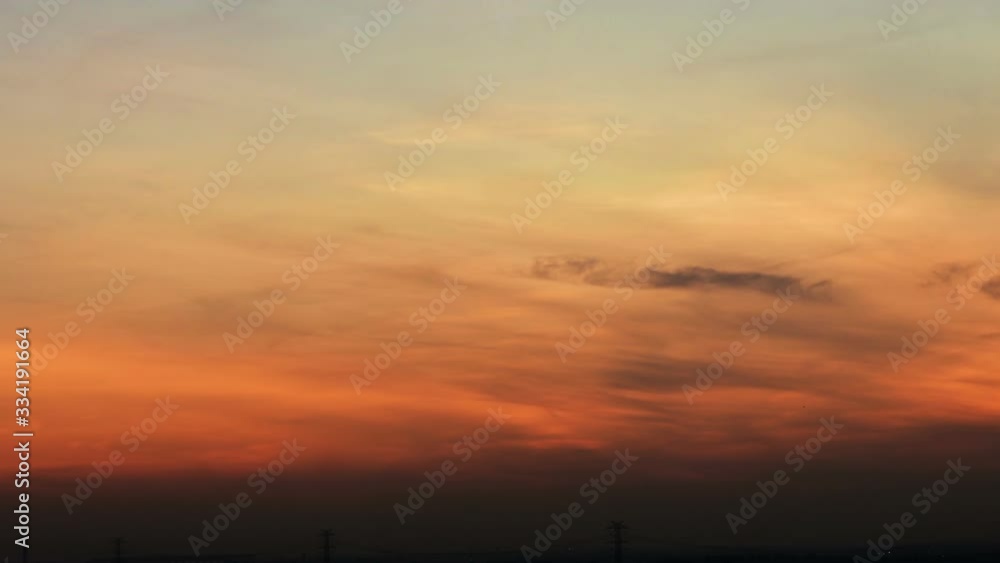 4K Time lapse sunset sunrise and beautiful twilight fluffy storm cloudy blue and yellow sky smoothly flowing to fantastic mind. Rainy good evening and have a nice day concept. 4K Time lapse sunset sunrise and beautiful twilight fluffy storm cloudy blue and yellow sky smoothly flowing to fantastic mind. Rainy good evening and have a nice day concept.