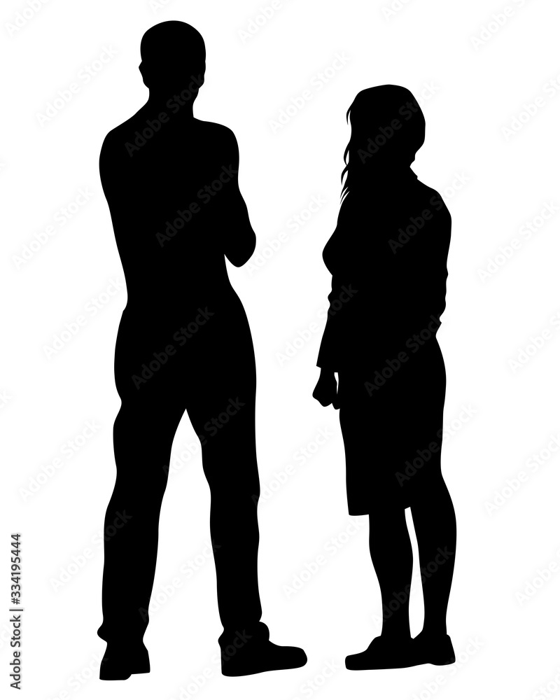 Young man and woman are standing next to each other. Isolated silhouette on a white background Young man and woman are standing next to each other. Isolated silhouette on a white background