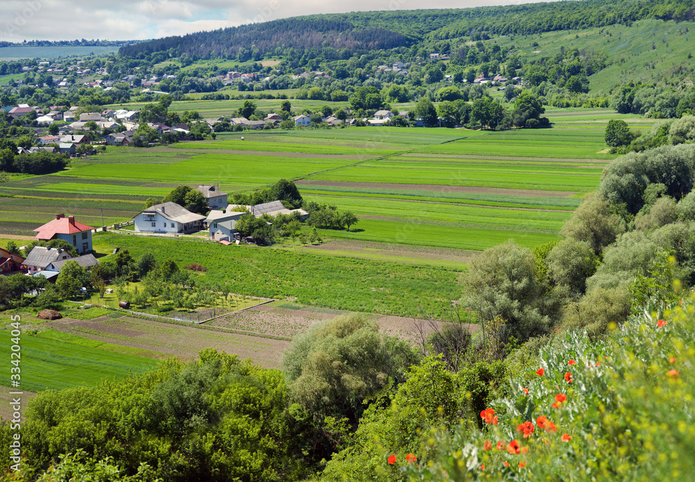 Obraz premium Ukraine, Podgora village, Ternopil region, Terebovlya district. Pidhiryan Monastery. View from the monastery to the neighboring villages of Podgora, Semeniv, Zelenche.