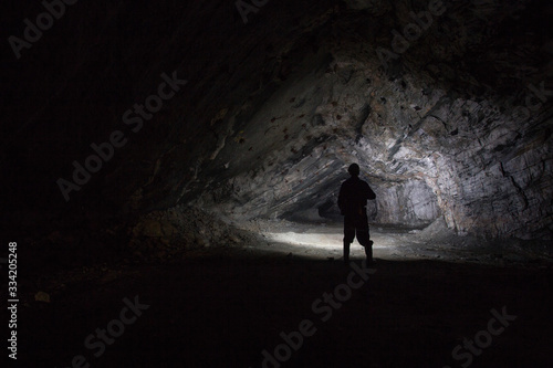 Miners in underground gold quartz mine tunnel