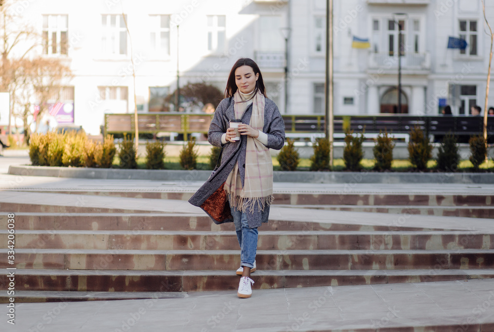 Woman portrait walking in the street