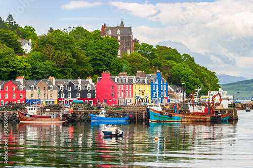 Port with boats in Tobermory in Scotland photo